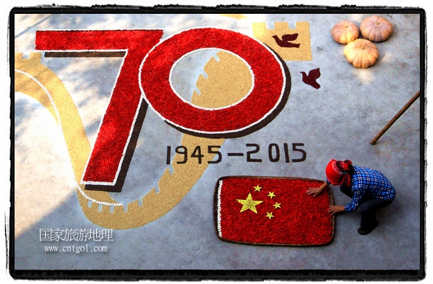 江西婺源农民用作物拼出巨幅抗战胜利纪念图案(图)